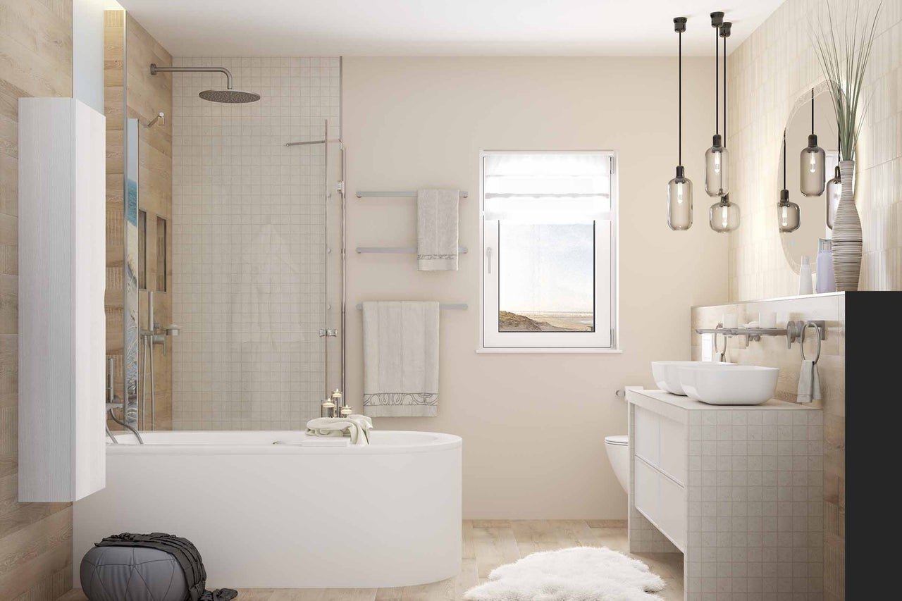Salle de bain lumineuse avec baignoire, douche, lavabo et fenêtre
