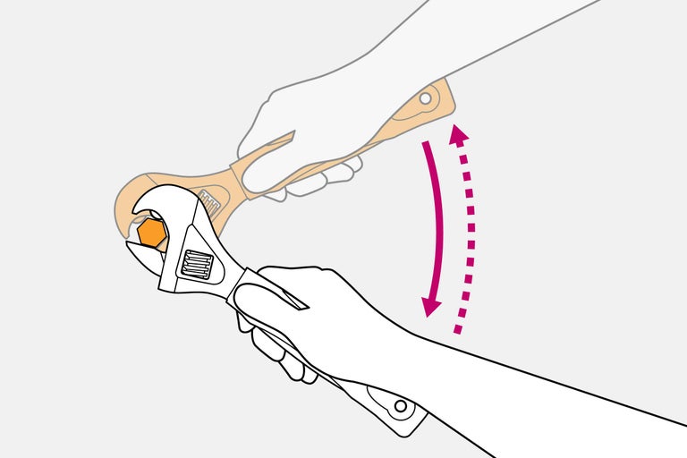 Illustration d'une main utilisant une clé à molette pour serrer une vis