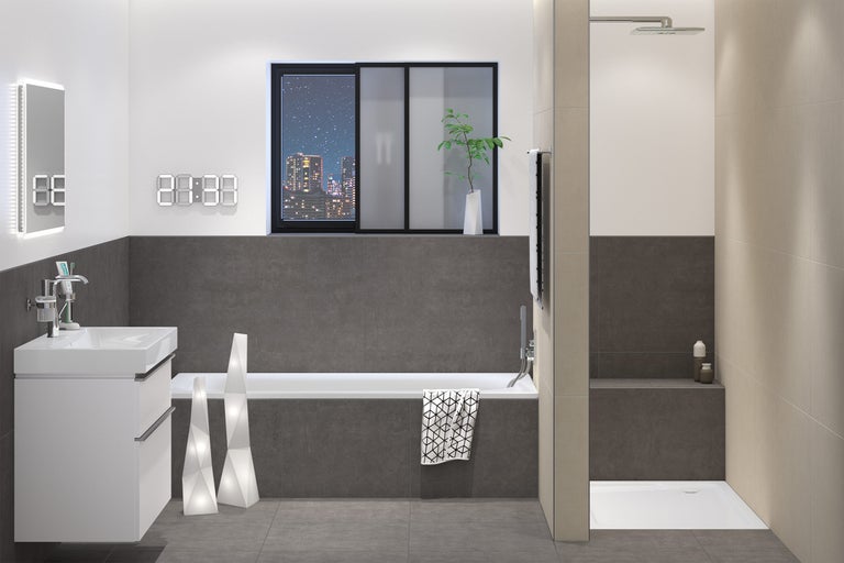 Salle de bain moderne avec lavabo, baignoire et douche