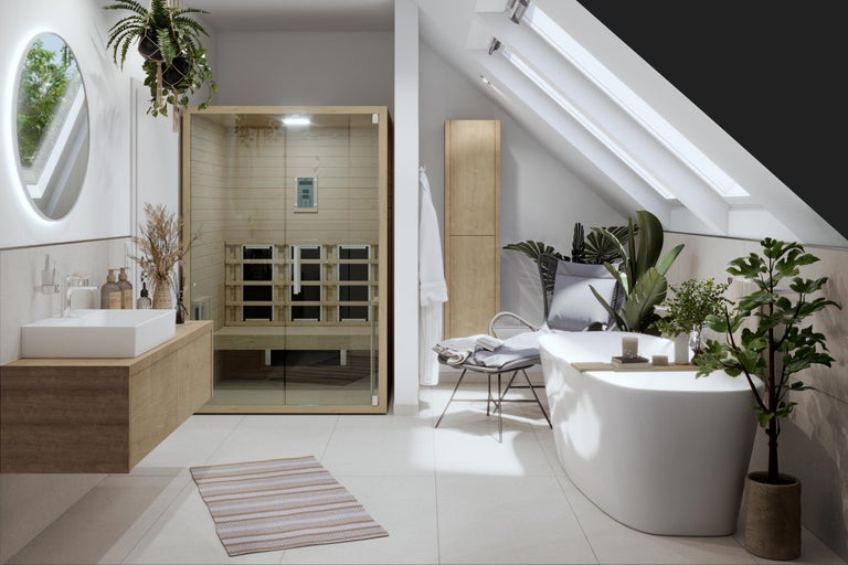 Helles Badezimmer mit freistehender Badewanne, Sauna und Waschtisch