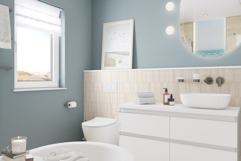 Salle de bain moderne avec lavabo, miroir et toilettes