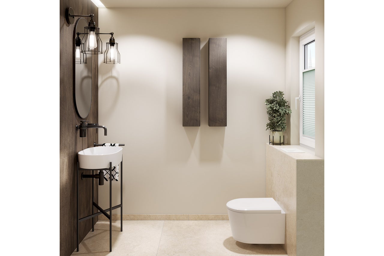 Toilettes d'invités modernes avec lavabo blanc sur cadre noir, WC suspendu, armoires en bois étroites, miroir ovale et appliques industrielles.