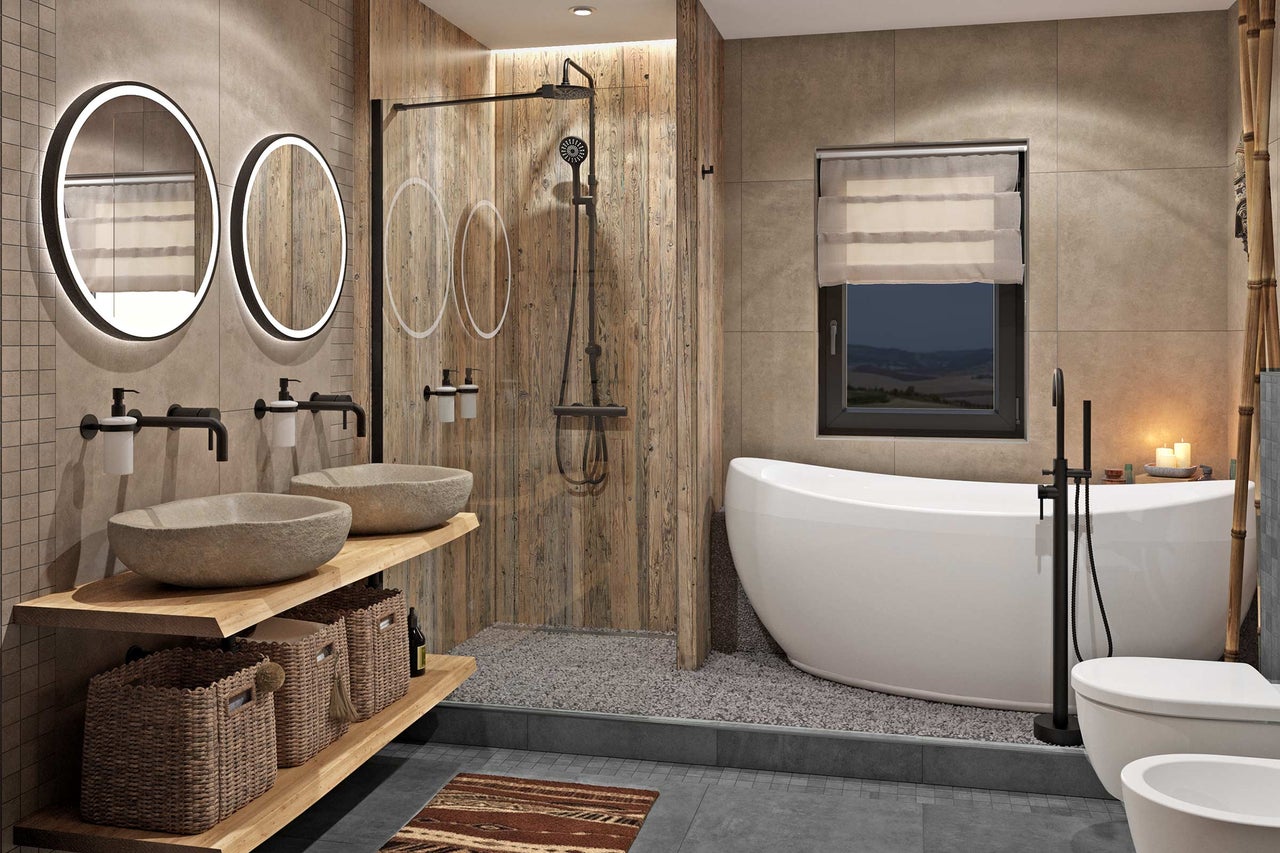 Salle de bain lumineuse avec double vasque, douche, baignoire et WC