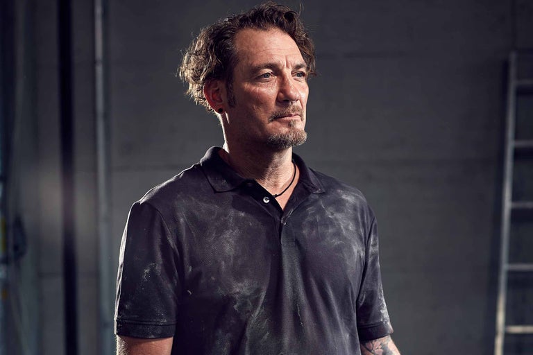 Portrait d'un artisan en tenue de travail