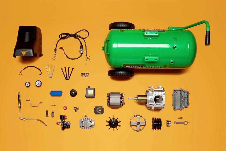 Schéma éclaté d'un compresseur d'air vert avec différentes pièces détachées