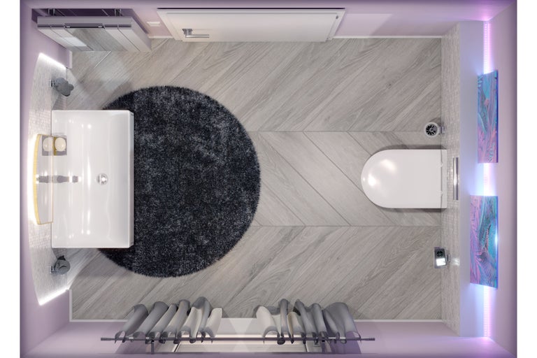 Vue de dessus d'une salle de bains avec lavabo, toilettes, tapis et sèche-serviettes