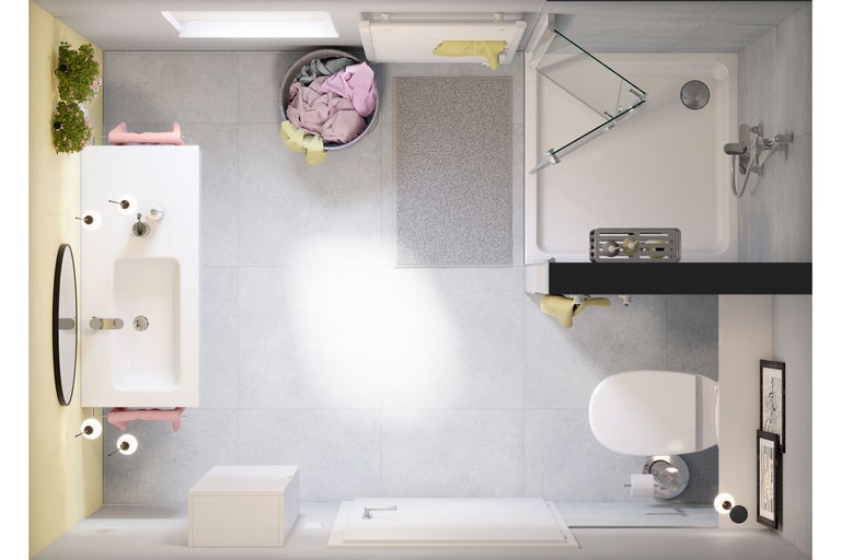 Vue de dessus d'une salle de bains avec lavabo, douche, toilettes et panier à linge
