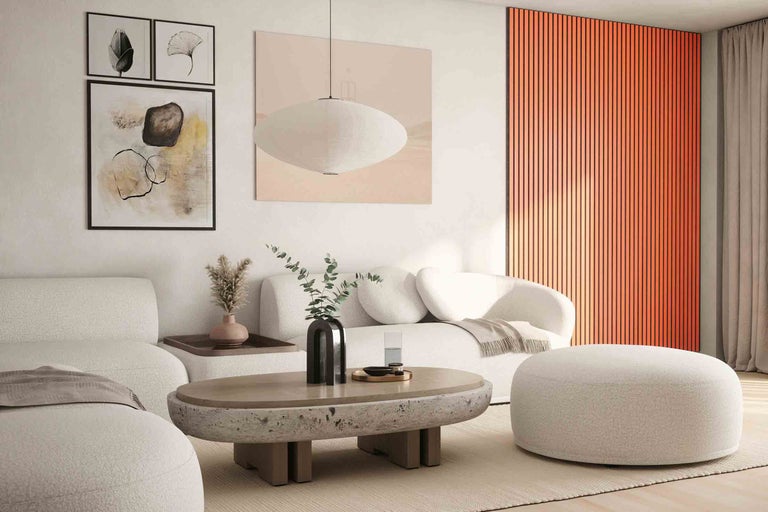 Salon avec canapé, table basse, lampe et panneaux muraux pour un intérieur moderne