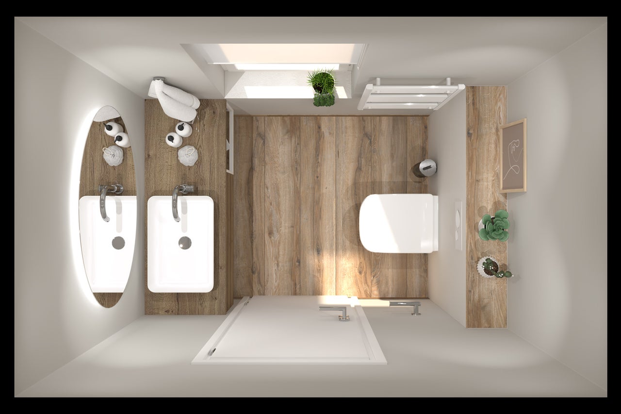 Vue de dessus d'une salle de bains moderne avec sol en bois, lavabo blanc, miroir rond lumineux, WC et receveur de douche plat.