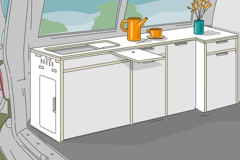 Extension de camping avec évier, plaque de cuisson et tiroirs dans le véhicule.