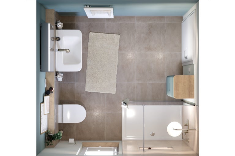 Vue de dessus d'une salle de bains avec lavabo, toilettes, baignoire et tapis de bain