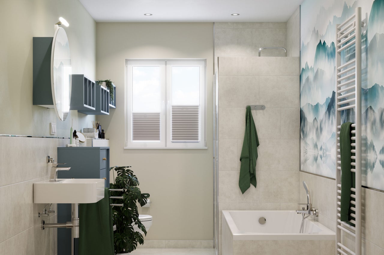 Salle de bain lumineuse avec lavabo, miroir, baignoire, sèche-serviettes et fenêtre pour une ambiance conviviale