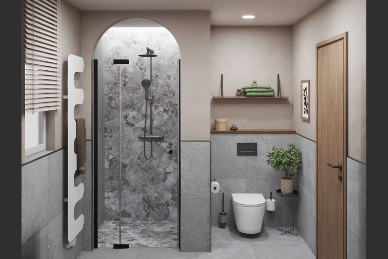 Salle de bains moderne avec douche à l'italienne voûtée, WC suspendu, radiateur design blanc et carreaux aspect pierre.
