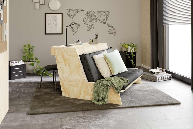 Multifunktionales Möbelstück mit Schreibtisch und Schlafsofa in einem Raum.