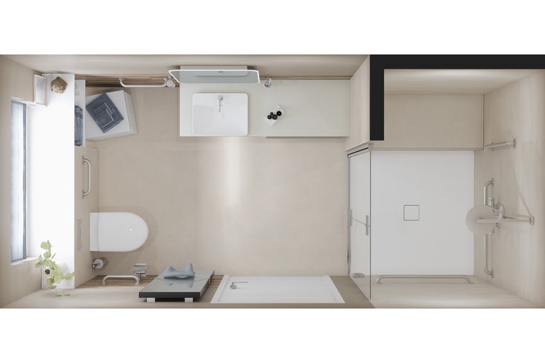 Vue de dessus d'une salle de bains accessible avec toilettes, lavabo, espace de rangement, douche avec porte en verre et barres d'appui.