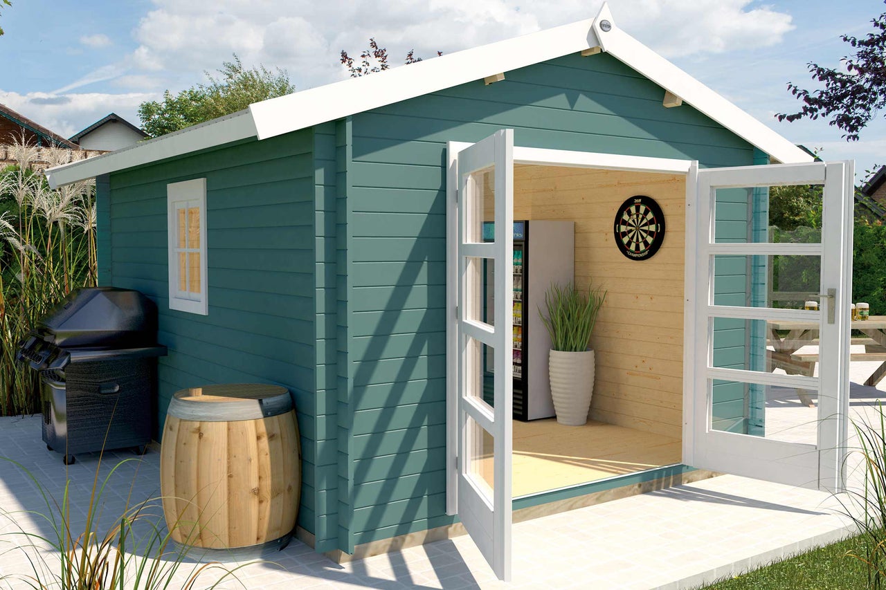 Abri de jardin avec portes ouvertes, barbecue et décoration à l'extérieur