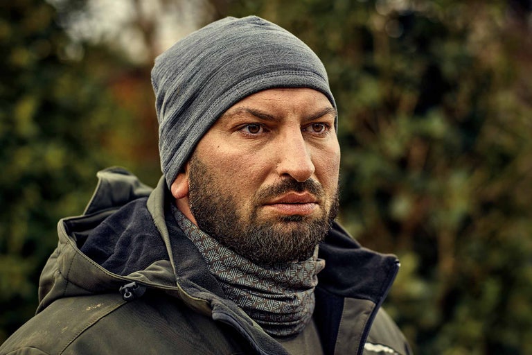 Portrait d'un homme avec un bonnet et une veste d'hiver