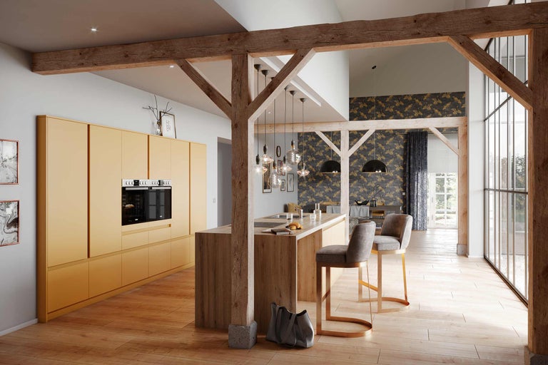 Cuisine lumineuse avec poutres en bois, îlot de cuisine, tabourets de bar et four intégré.