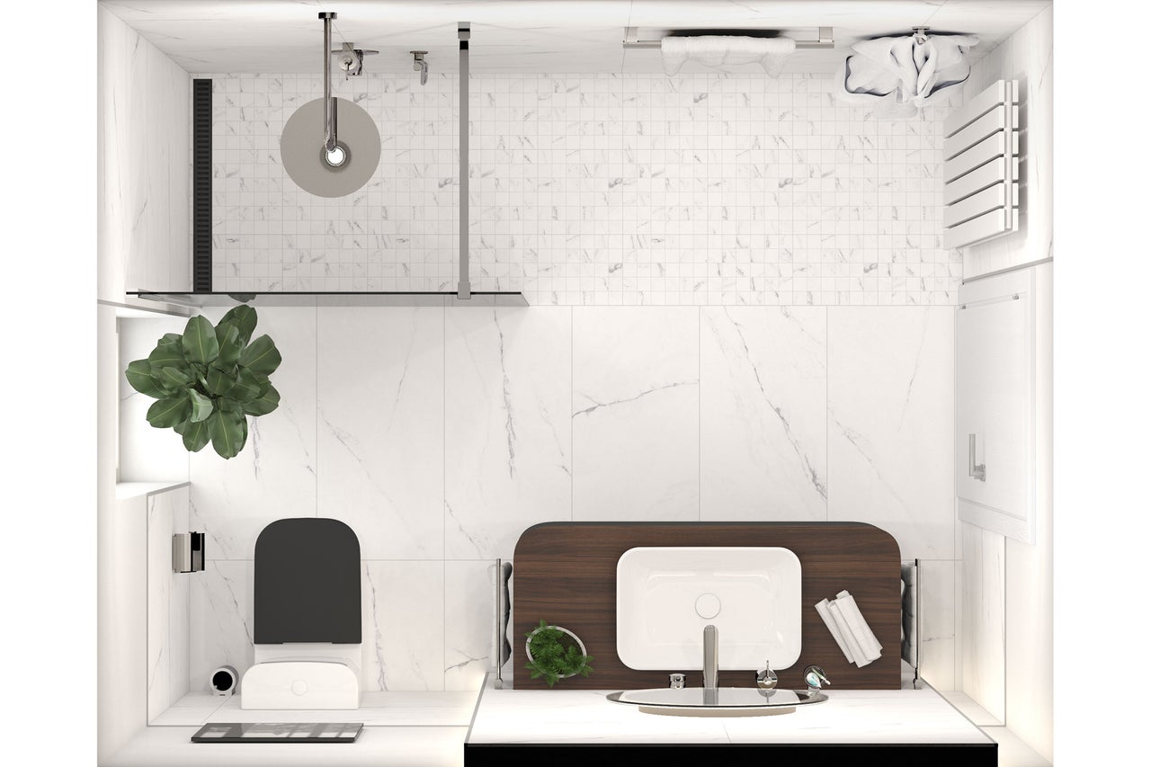 Vue de dessus d'une salle de bains avec douche, toilettes et lavabo