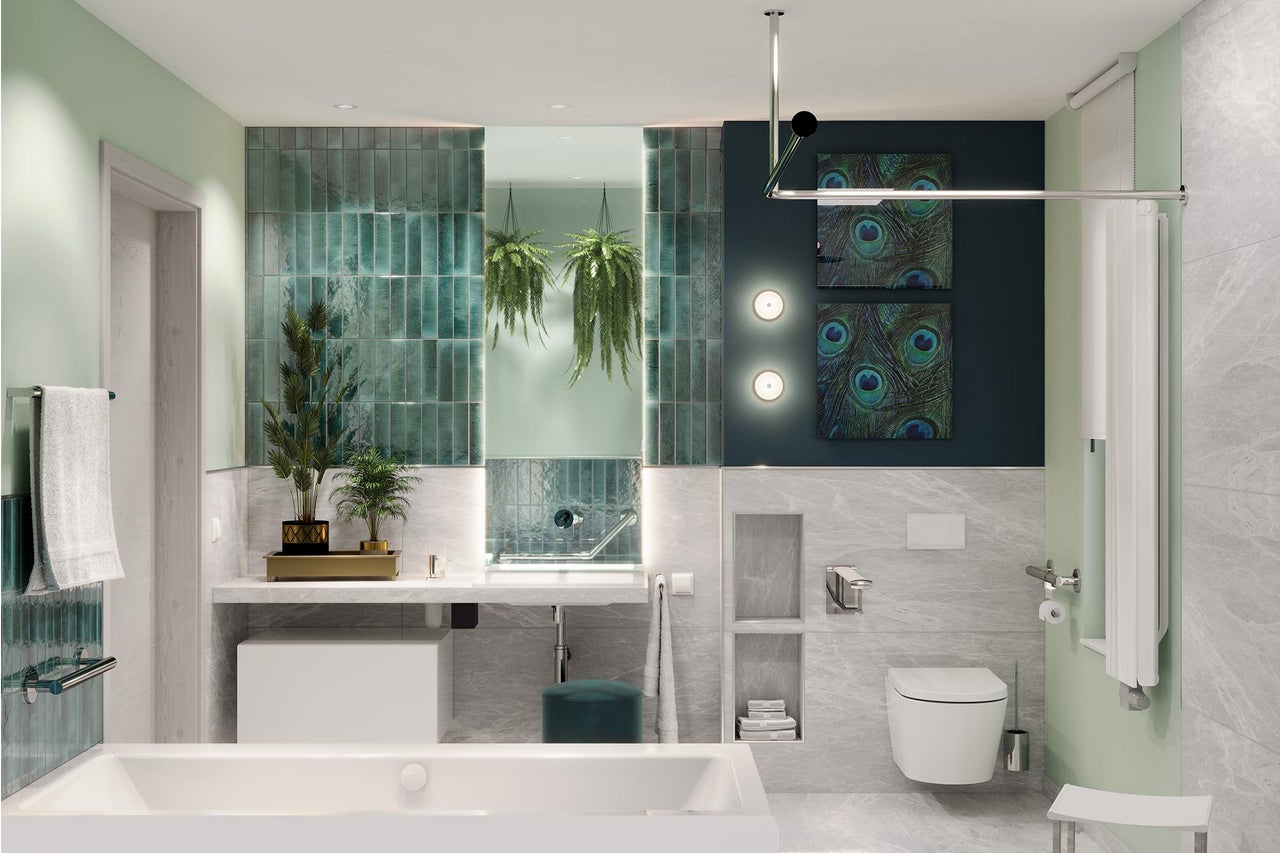 Salle de bain moderne avec baignoire, lavabo et toilettes dans un design lumineux