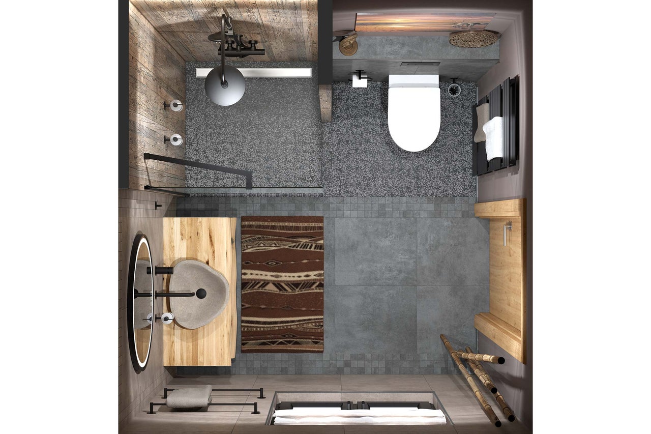 Vue de dessus d'une salle de bains avec douche à l'italienne, vasque en pierre sur meuble en bois, WC suspendu et carrelage gris.