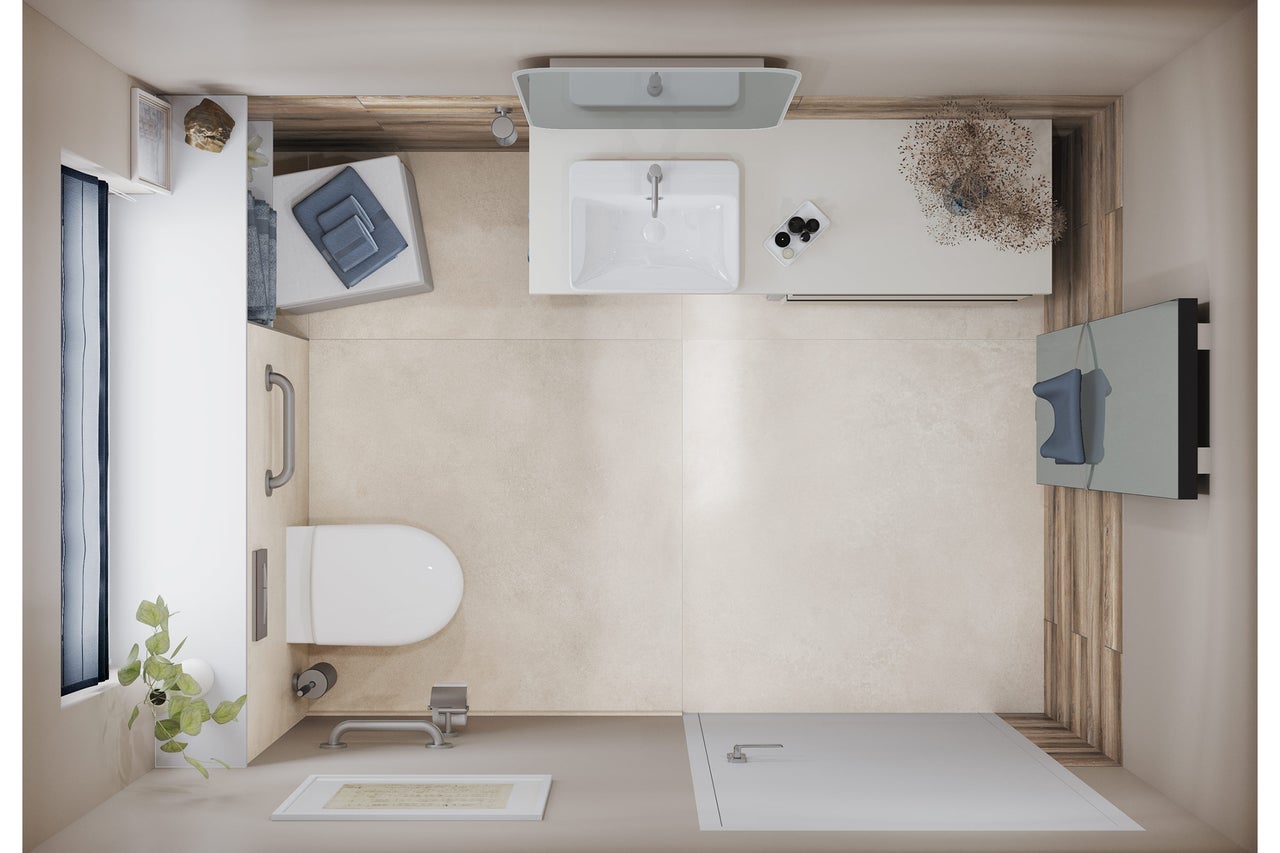 Vue de dessus d'une salle de bain lumineuse avec toilettes, lavabo et douche