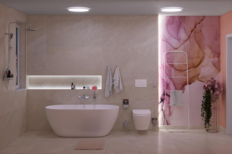 Salle de bains moderne avec baignoire îlot, toilettes et sèche-serviettes