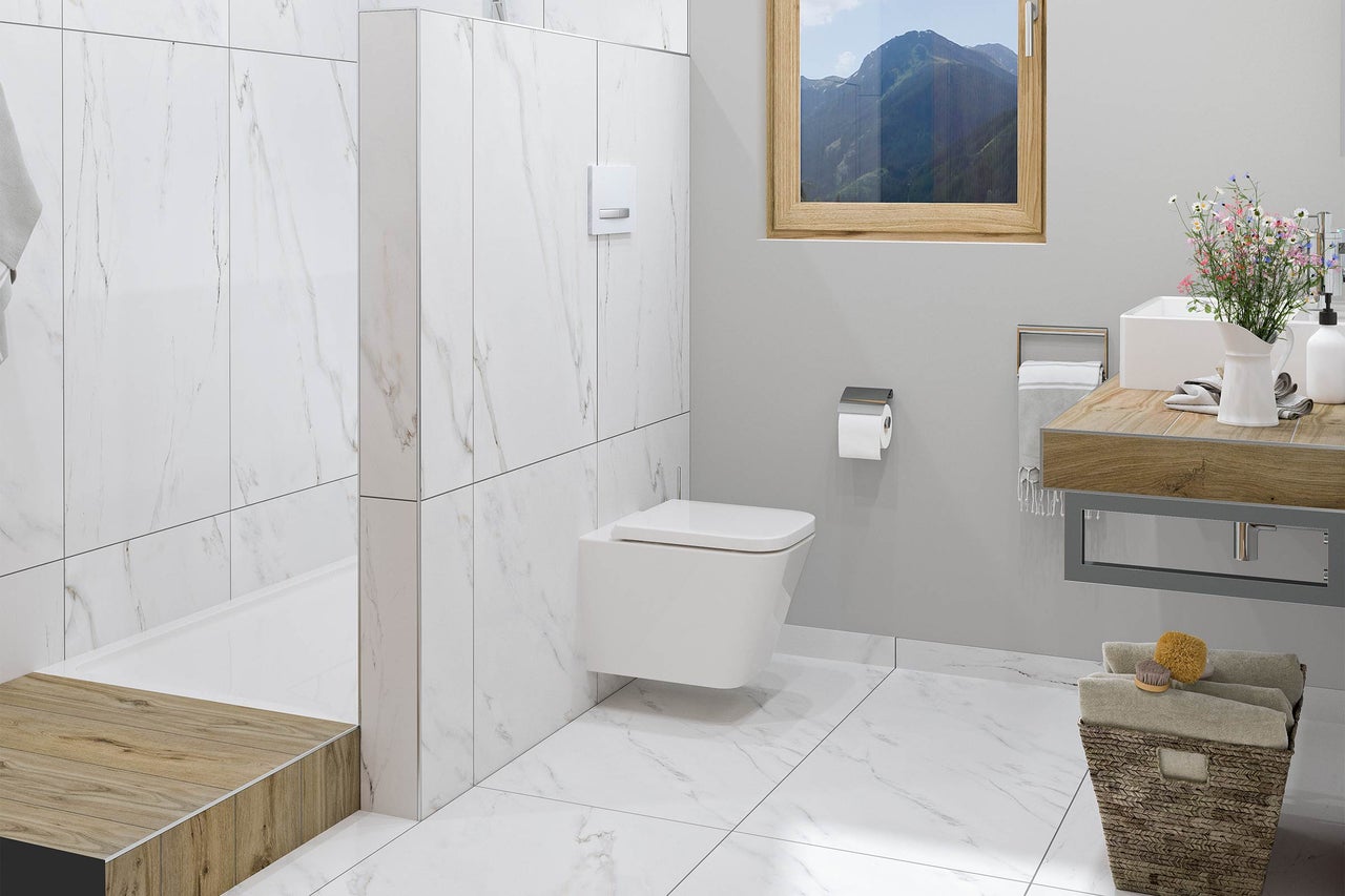 Salle de bain moderne avec toilettes, lavabo et douche