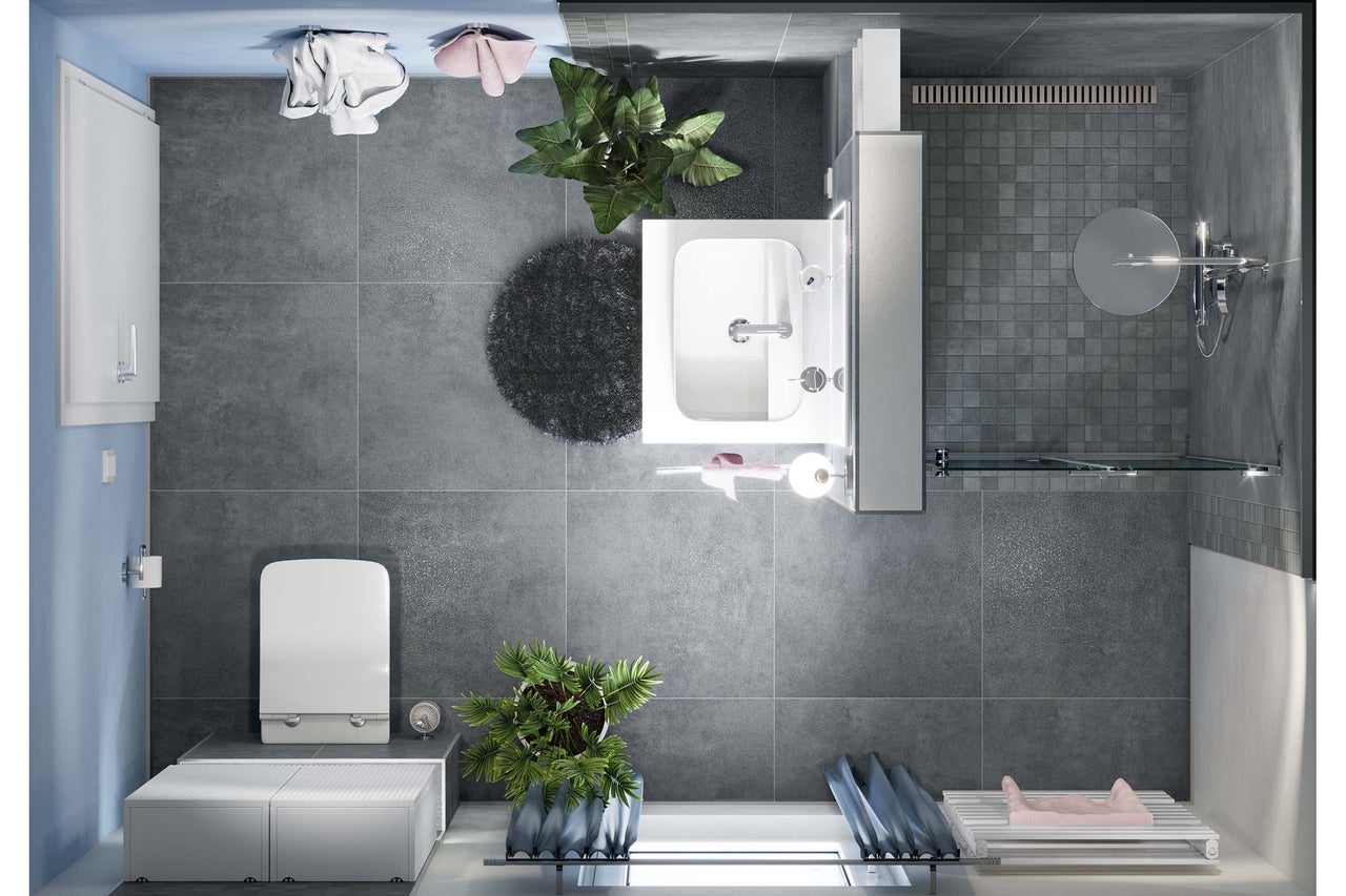 Vue de dessus d'une salle de bains avec douche, lavabo, toilettes et meubles de salle de bains