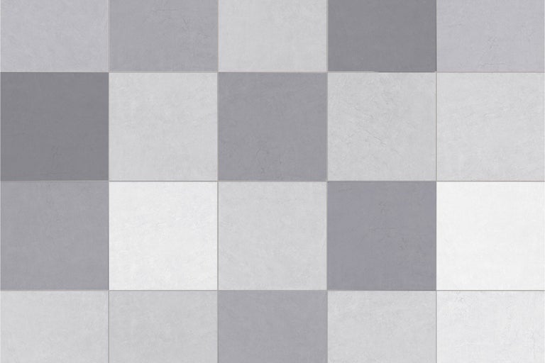 Motif de carrelage composé de carreaux de sol carrés dans différentes nuances de gris avec une texture pierre en damier