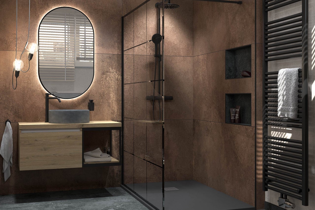 Salle de bains moderne avec douche, lavabo, miroir et sèche-serviettes.