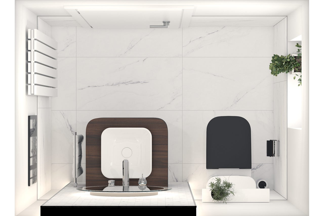 Salle de bain lumineuse avec lavabo, radiateur, toilettes et plantes