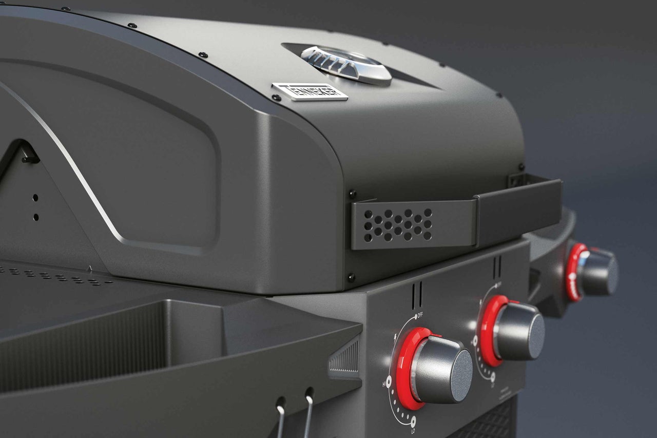 Vue détaillée d'un barbecue à gaz avec boutons de réglage et grille de maintien au chaud