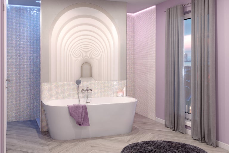 Salle de bain lumineuse avec baignoire îlot, mosaïque et décoration murale
