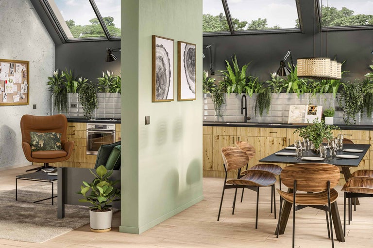 Séjour lumineux avec kitchenette en bois, table à manger, chaises et plantes d'intérieur