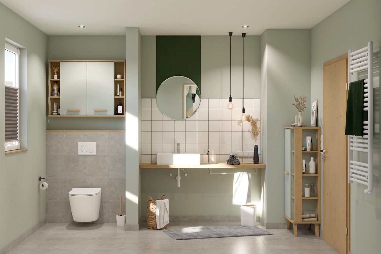 Salle de bain lumineuse avec lavabo, miroir, toilettes et radiateur