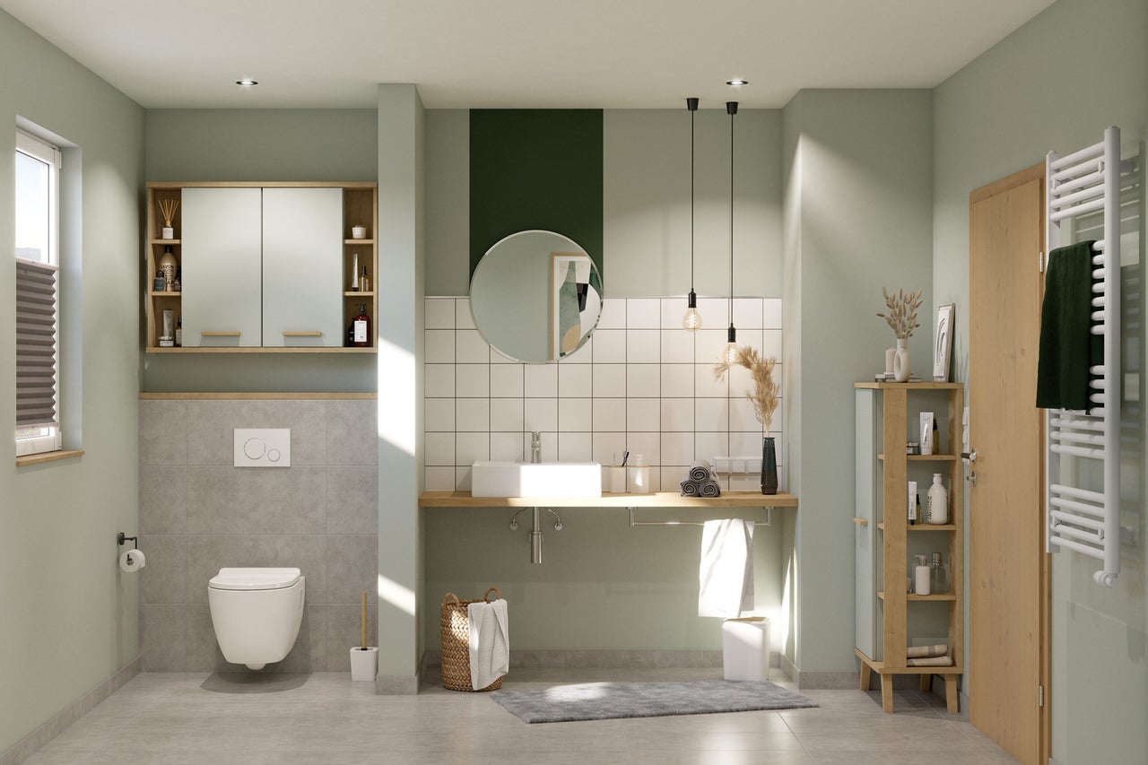 Helles Badezimmer mit Waschbecken, Spiegel, Toilette und Badmöbeln für eine moderne Einrichtung