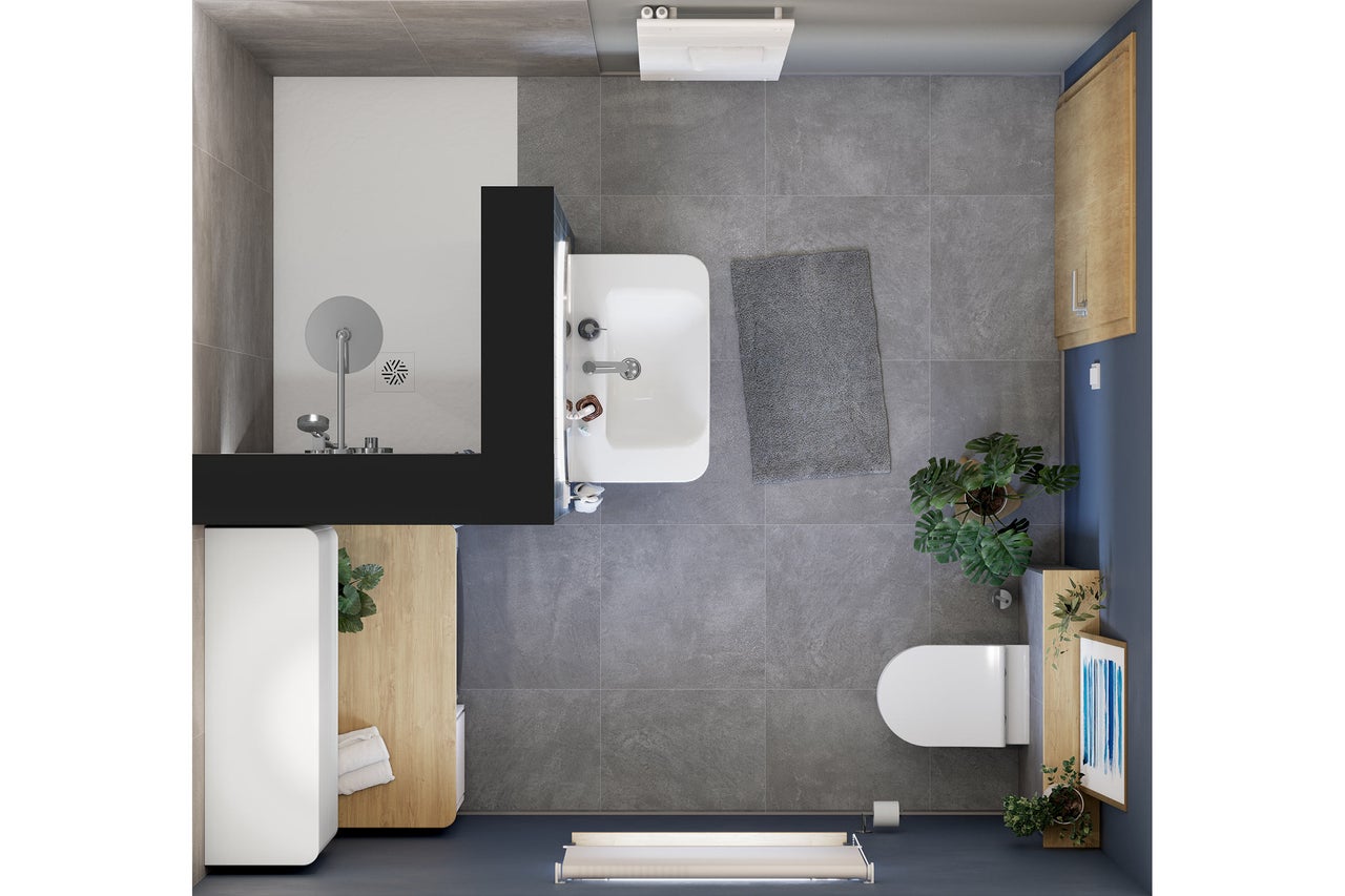 Vue de dessus d'une salle de bains avec douche, lavabo, toilettes et meubles de salle de bains sur carrelage gris.