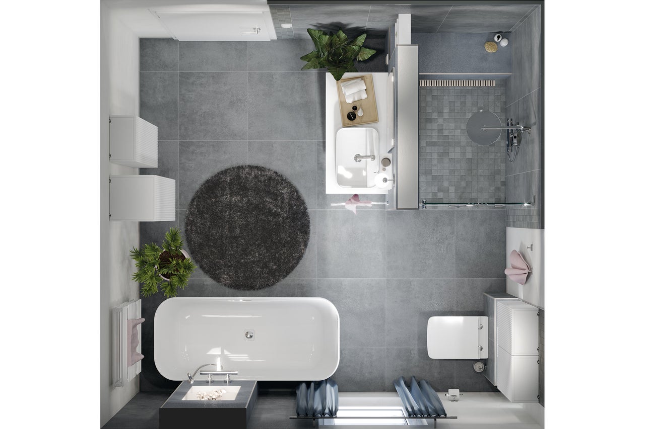Vue de dessus d'une salle de bains moderne avec baignoire, douche, lavabo et toilettes