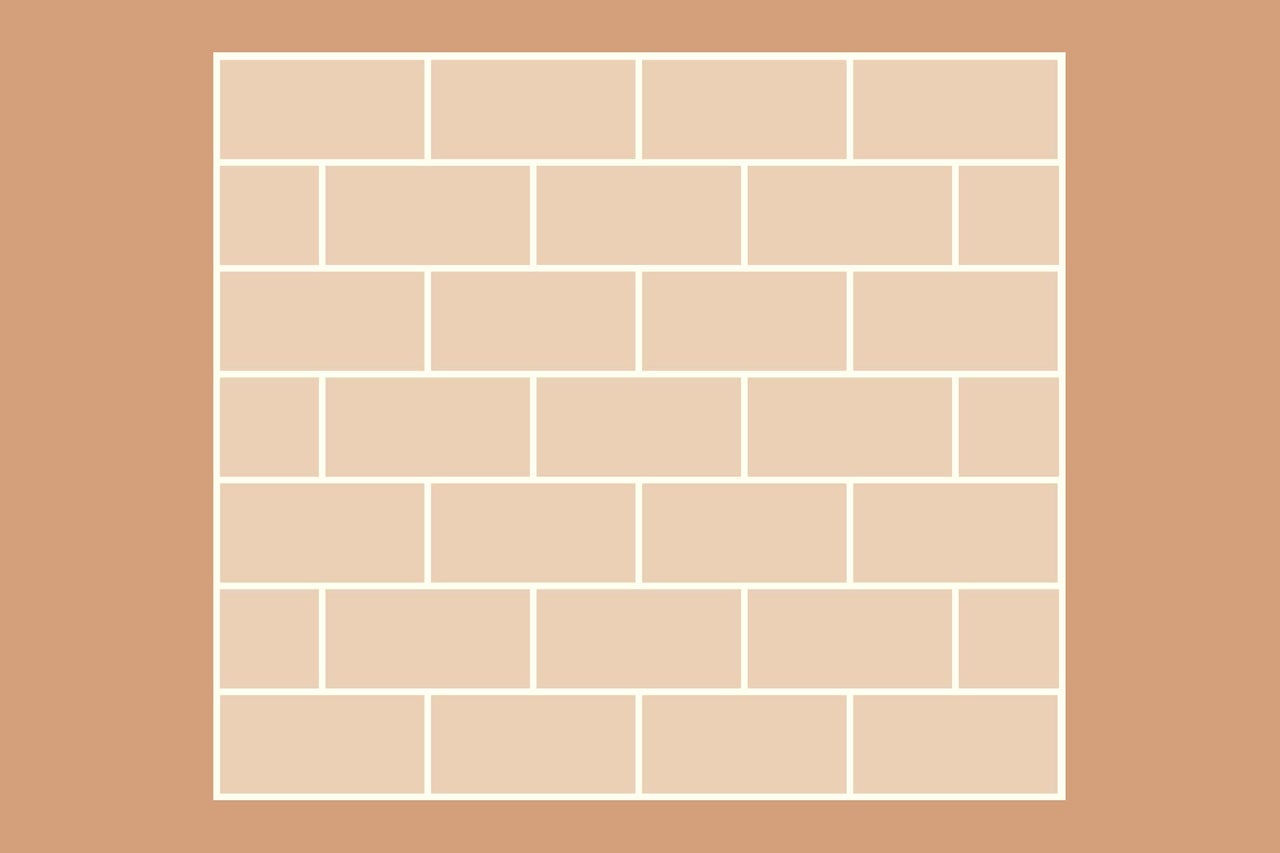 Des pavés rectangulaires forment une maçonnerie.