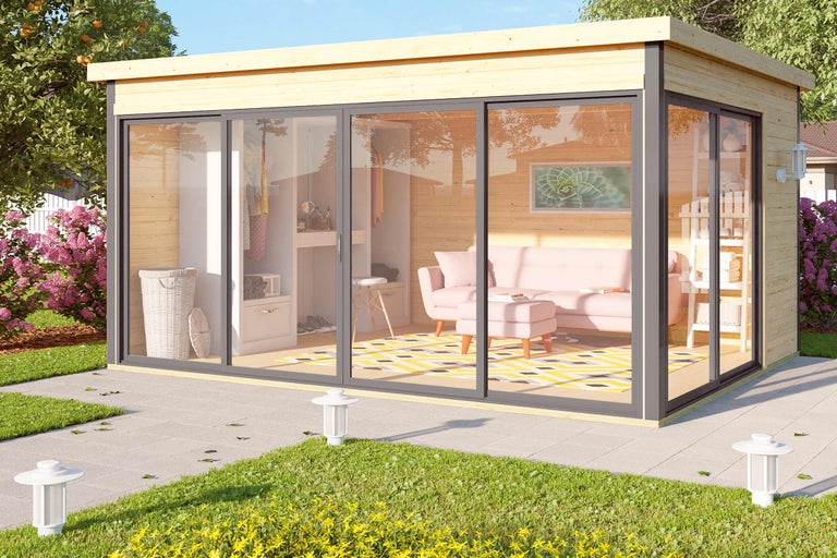 Maison de jardin moderne avec portes coulissantes et intérieur dans le jardin