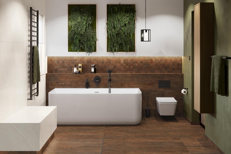 Salle de bain lumineuse avec baignoire, toilettes, lavabo et décorations