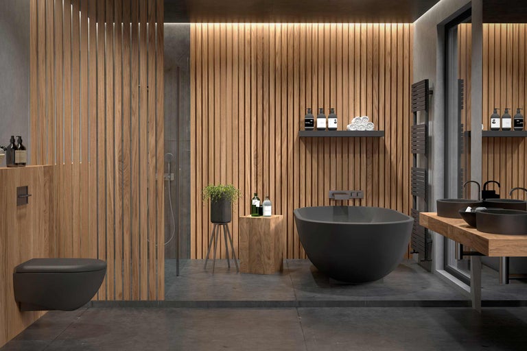 Salle de bain lumineuse avec douche, baignoire, lavabo et lambris en bois