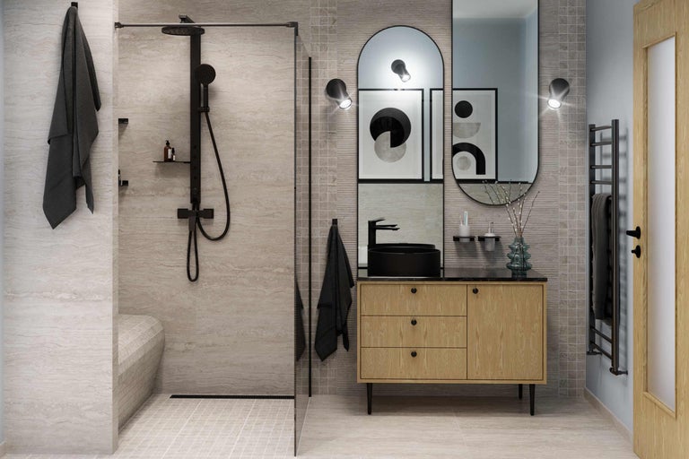 Salle de bain lumineuse avec douche, meuble-lavabo et sèche-serviettes