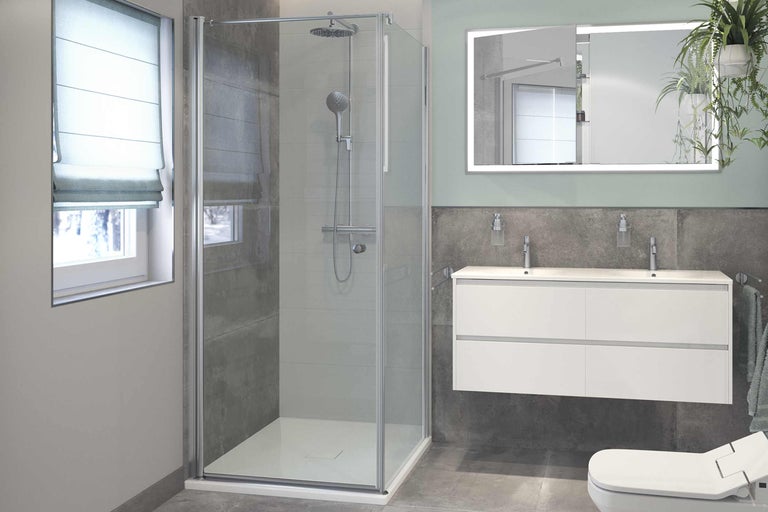 Salle de bain moderne avec cabine de douche, meuble-lavabo et miroir éclairé