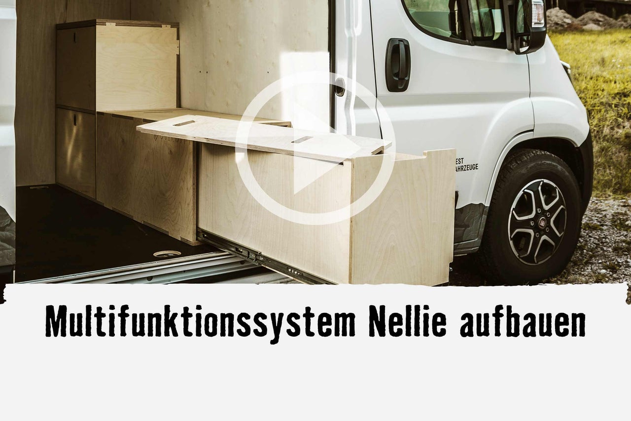 
			Système multifonctionnel Nellie dans un véhicule en cours d&apos;aménagement avec tiroirs et espace de rangement
		