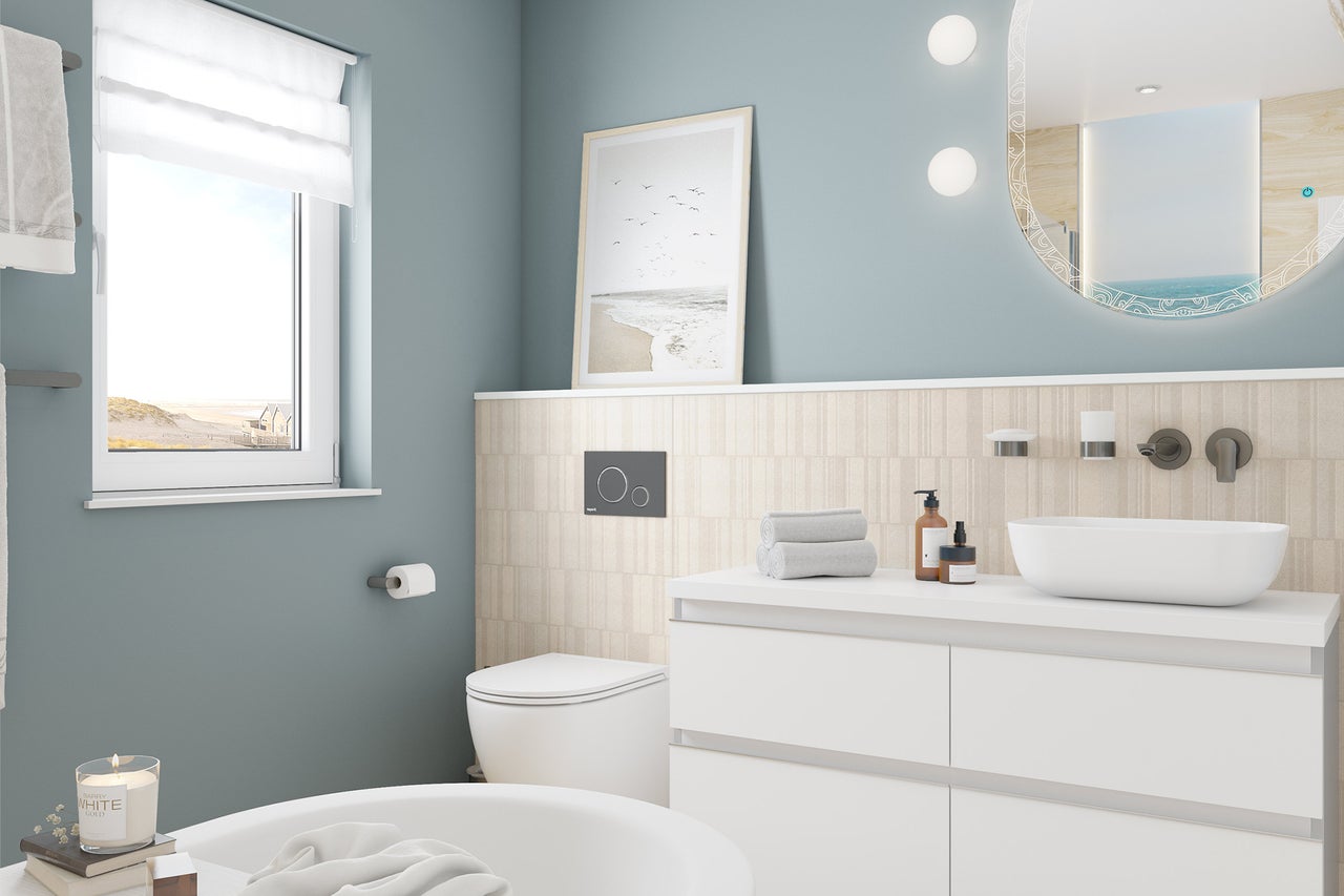 Helles, modernes Badezimmer mit Waschtisch, Aufsatzbecken, rundem beleuchtetem Spiegel, Hänge-WC und Fenster.