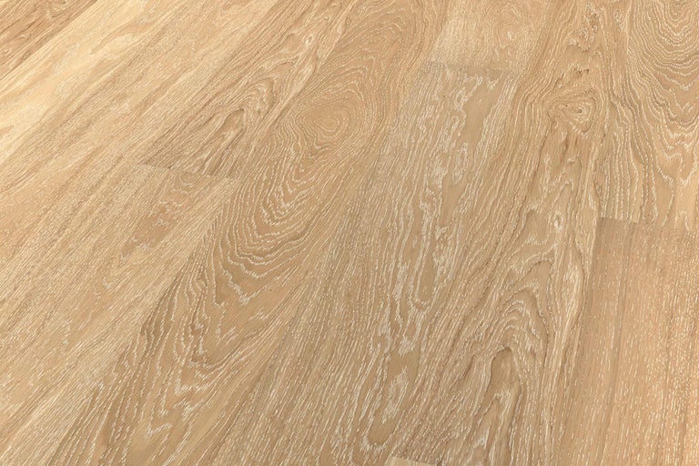 Gros plan d'un sol stratifié avec une texture de bois