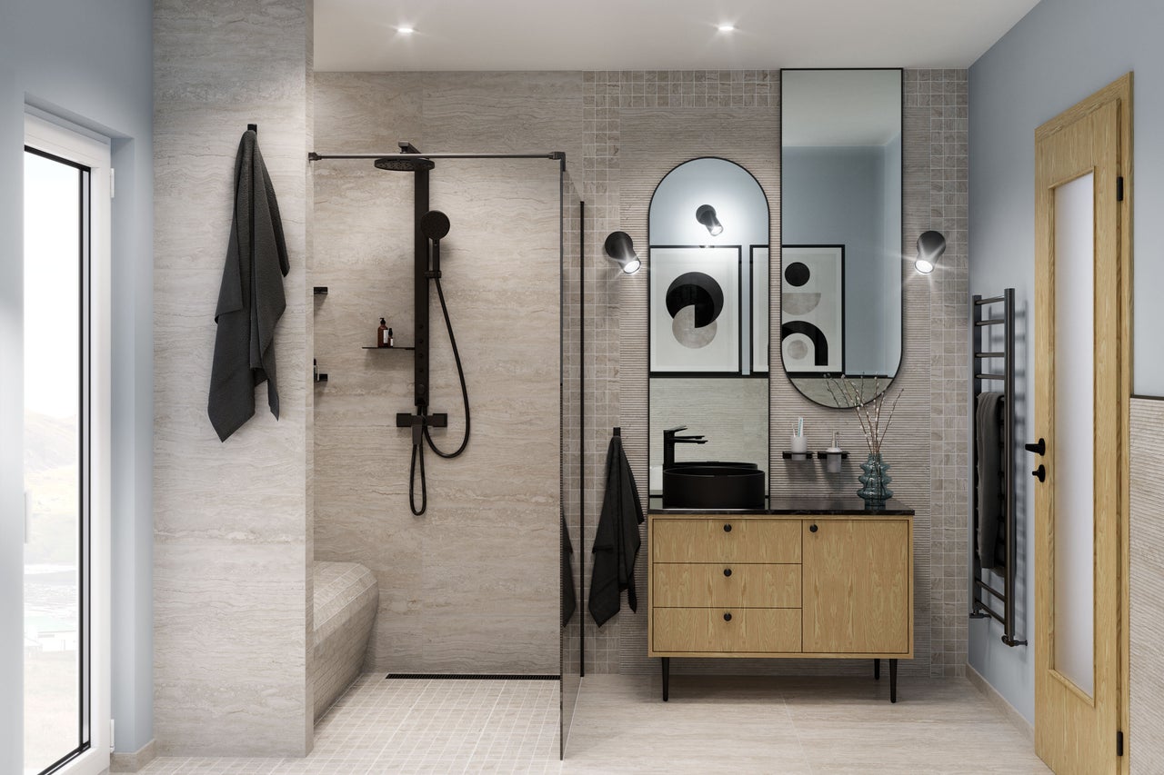 Salle de bains lumineuse avec douche, meuble-lavabo et miroir