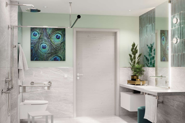 Barrierefreies Badezimmer mit Toilette, Waschbecken und Dusche